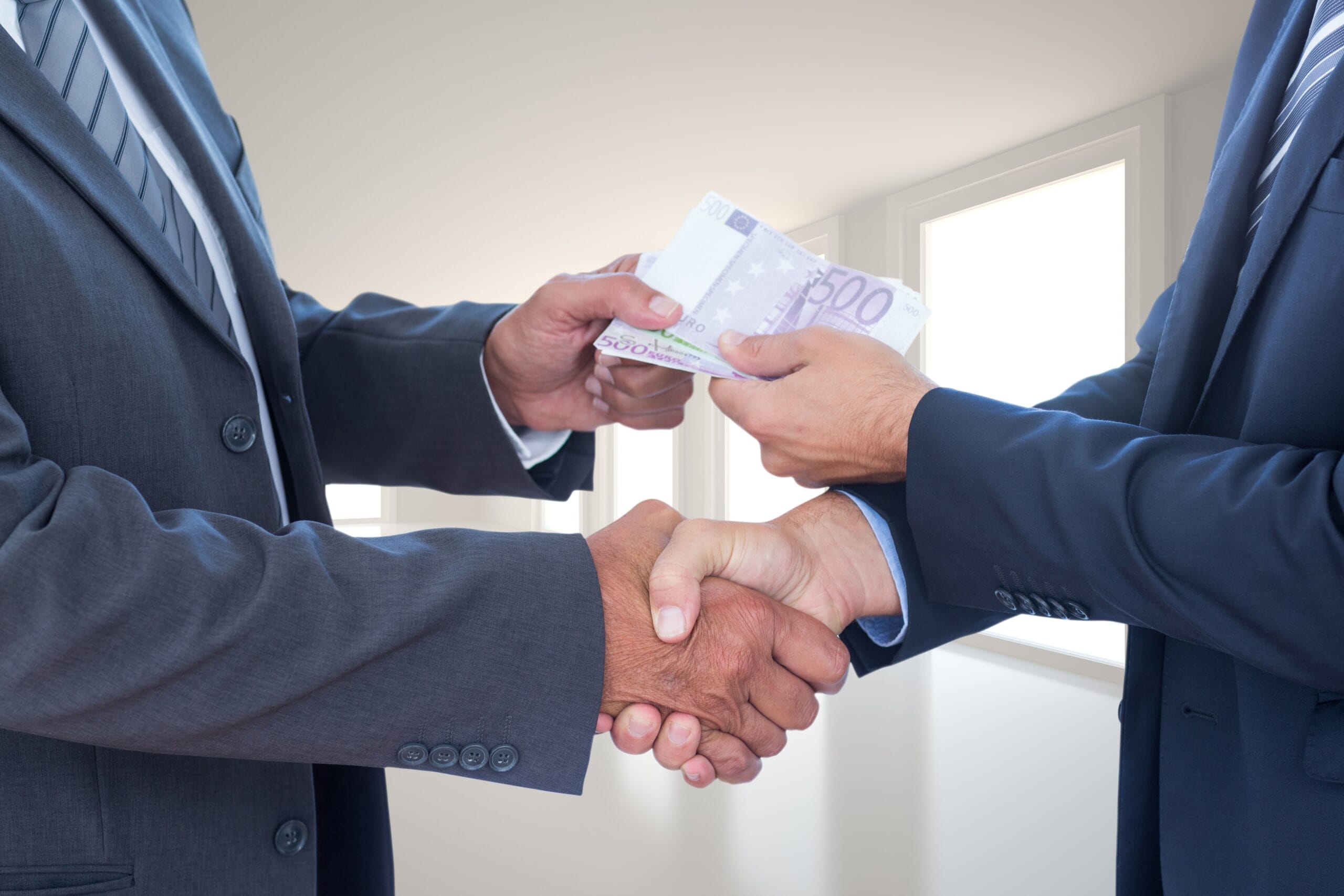 businessmen-with-bills